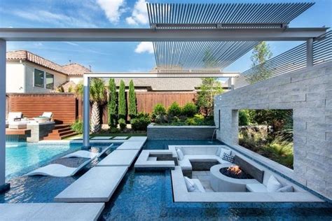 Outdoor Pool Inspiration With Couches And Fire Pit