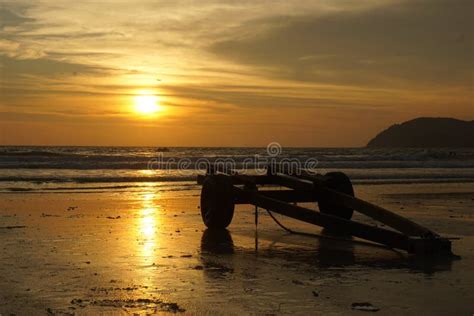 Golden sunset on the beach stock photo. Image of golden - 154891856