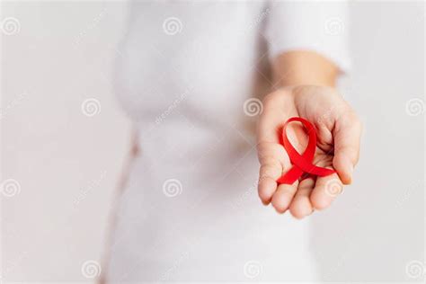 Closeup Woman Hand Holding Red Ribbon Hiv World Aids Day Awareness