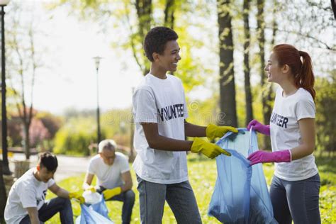 Happy Two Volunteers Protecting Environment Stock Photo Image Of Park