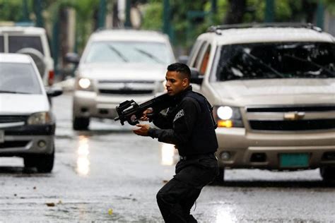 Clashes between Venezuelan police and gangs leave 26 dead | The Straits ...