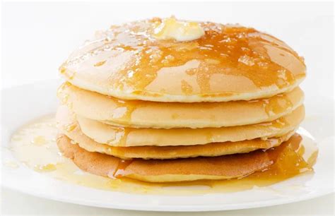 Pancakes with syrup and butter — Stock Photo © mcgphoto #3892551