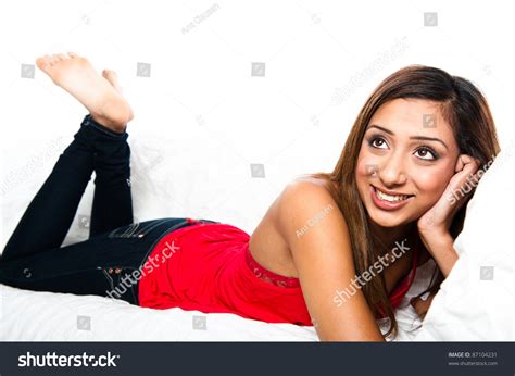 2 Asian Teenage Girl On The Sofa Feet In Air Beautiful Asian Indian