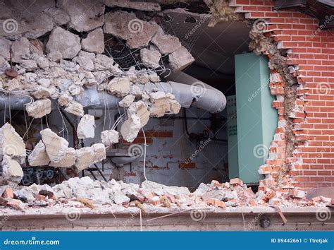 Hole in the Brick Wall of Wrecked Building at Demolition Site Stock ...