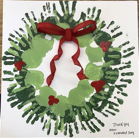 Handprint wreath with acrylic paints on canvas. | Handprint christmas ...