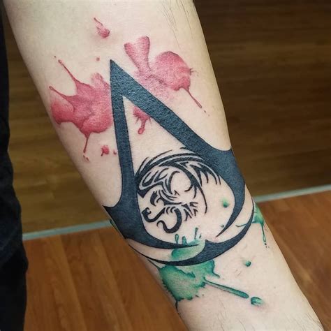 Tattoosassassins Creed Tattoo Tatouage Assassins Creed Assassins Creed Symbol Leg Tattoos