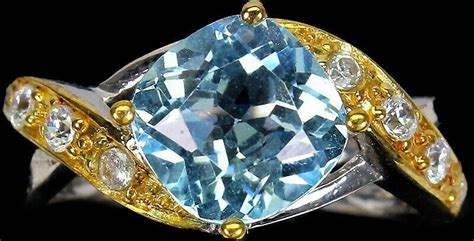 Pierścionek srebrny Sky Blue Topaz cyrkonie r 11 5 Ceny i opinie