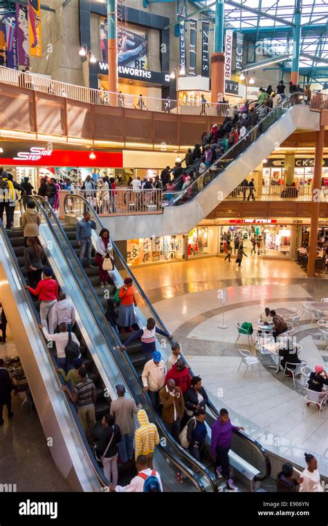 Johannesburg South Africa People On Escalator In Shopping Center In