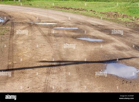 Rain Falling Into Muddy Puddle Hi Res Stock Photography And Images Alamy