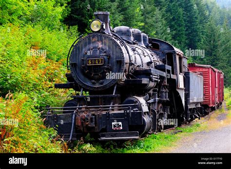 Canadian Pacific Rail's old steam locomotive #6947 and vintage freight ...