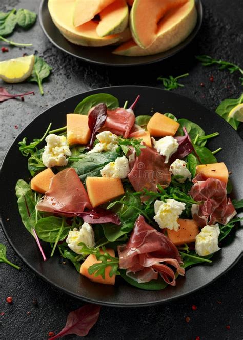 Parma Ham And Melon Salad With Mozzarella Green Leaves Mix Stock Image