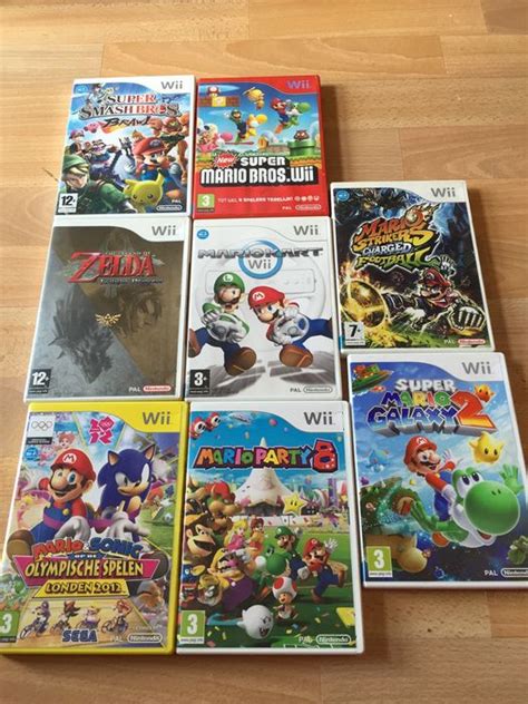 Lot of 8 nintendo Wii games including Zelda - Catawiki