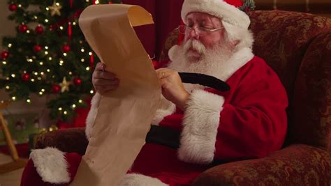 santa claus writes on list Stock Footage Video (100% Royalty-free ...