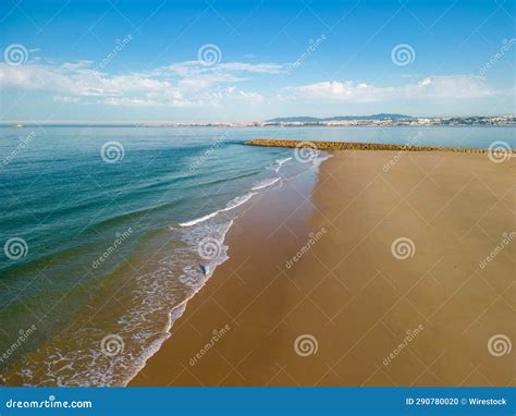 Stunning Aerial View Of The Shoreline Cova Do Vapor Beach In Trafaria