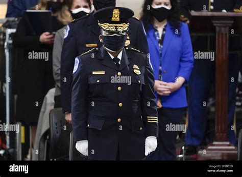 Acting U.S. Capitol Police chief Yogananda Pittman stands as slain U.S. Capitol Police officer ...