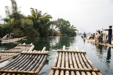 Bamboo Rafting Along Yulong River During The Winter Season With Beauty