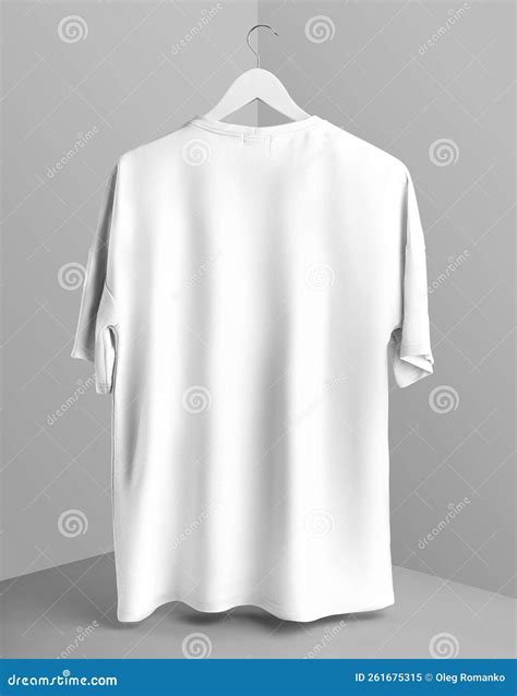 Mockup Of An Oversized White T Shirt Hanging On A Hanger Above A Cube