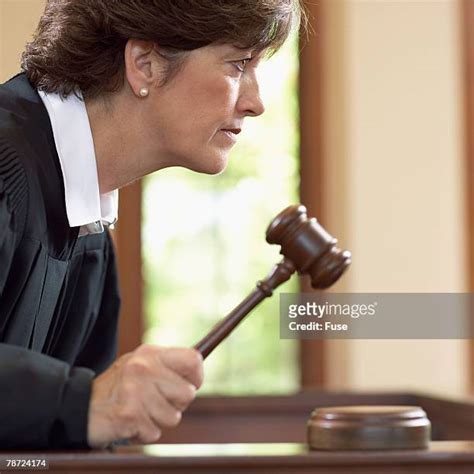 Judge Slamming Gavel Photos And Premium High Res Pictures Getty Images