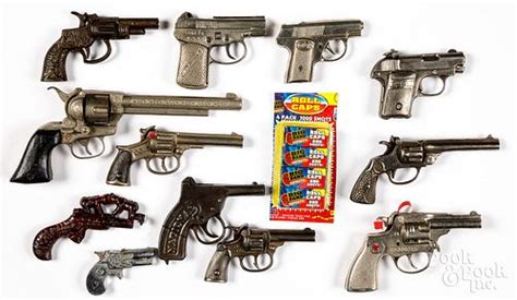 Collection of cap guns sold at auction on 17th March | Pook & Pook