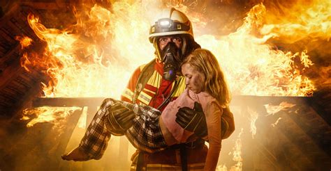 Firefighter Saves A Child Stock Photo Download Image Now Istock