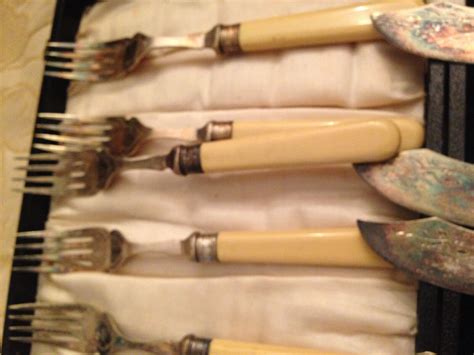 Antique Epns Fish Knives And Forks With Sterling Silver Bands With A