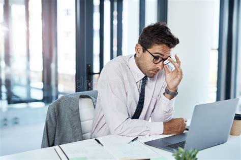 Headache Anxiety And Man On Laptop In Office Frustrated With Glitch Mistake Or Crisis Stress