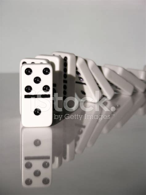 Falling Dominoes Stock Photo | Royalty-Free | FreeImages