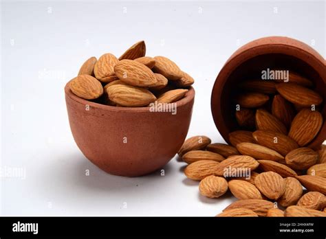 Roasted Salted Raw Cashew Nuts In A Wooden Bowl On A Rustic Table