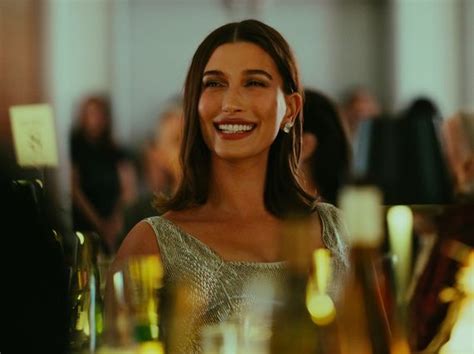 Hailey Bieber Poses Topless In Nothing But Hot Pants And Sunglasses