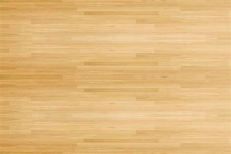 Hardwood maple basketball court floor viewed from above for natural texture and background ...