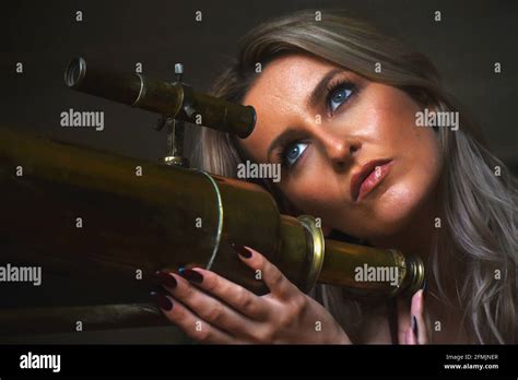 Beautiful Blonde Woman With Old Brass Telescope Close Up Portrait