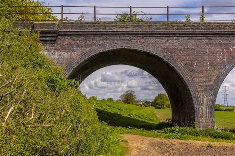 A View Beside The River Trent Flood Plain Levy Through An Arch Of The