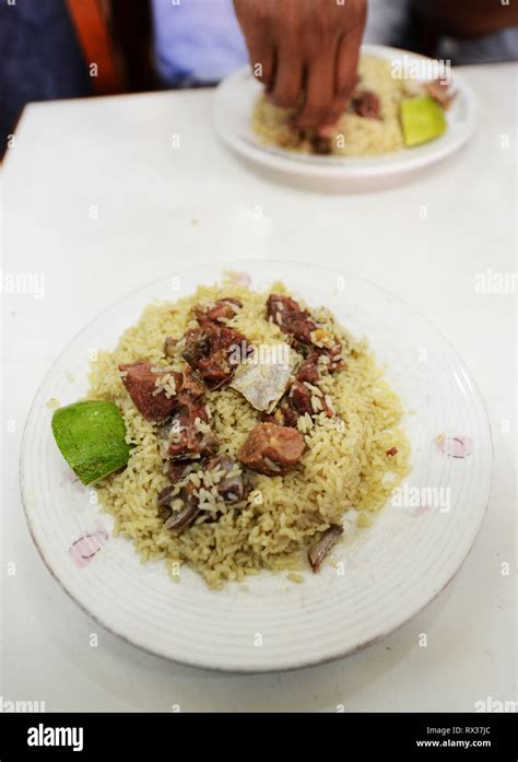 Enjoying A Bangladeshi Biriyani At The Original Haji Biriyani