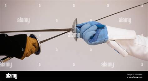 Swords for fencing and sword fighting Stock Photo - Alamy