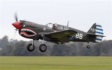 Asisbiz Airworthy warbird Curtiss P-40N Warhawk NZ3009 Flying Tigers 88 05