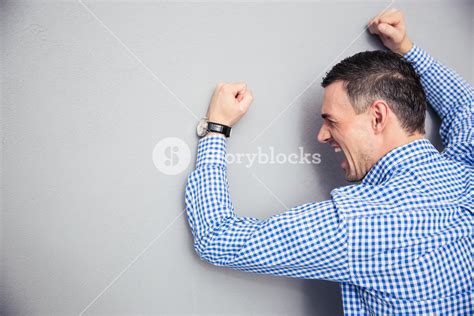 Angry Man Hitting Wall Royalty Free Stock Image Storyblocks