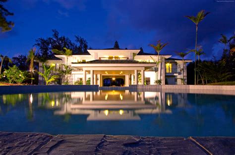 White Concrete House Near Swimming Pool During Nighttime Hd Wallpaper