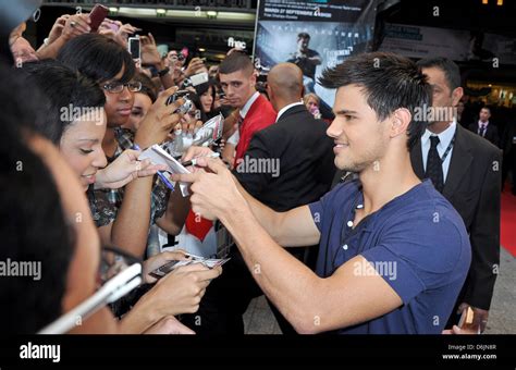 Taylor Lautner attends a fan signing session for his film 'Abduction ...