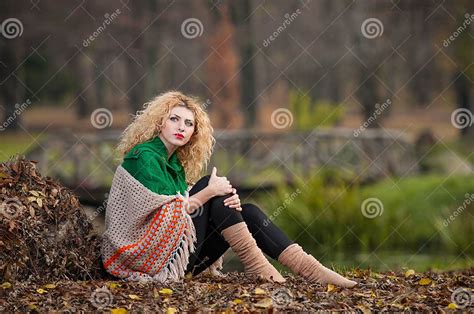 Beautiful Woman Posing In Park During Autumn Season Blonde Girl