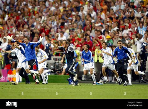 Greeces coach otto rehhagel c celebrates at the final whistle hi-res ...