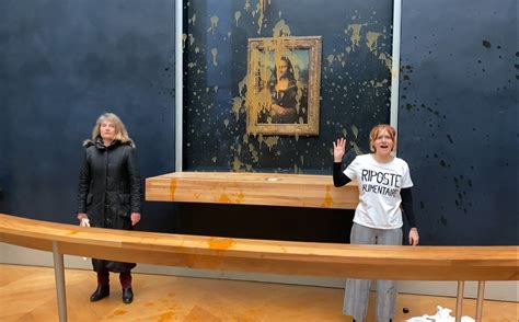 Mona Lisa Painting Targetted By Protesters Who Throw Pumpkin Soup At Da