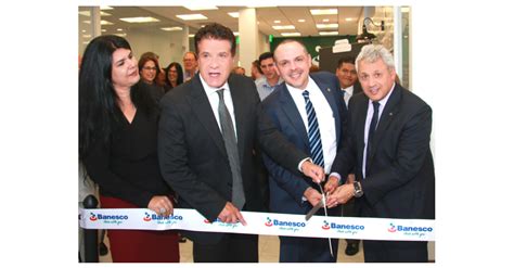 Correcting And Replacing Banesco Usa Hosts The Grand Opening And Ribbon