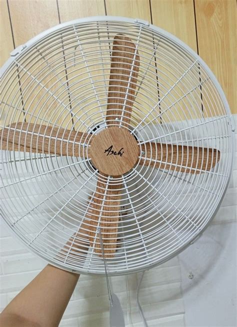 Asahi Aesthetic Wall Fan Wooden Design on Carousell