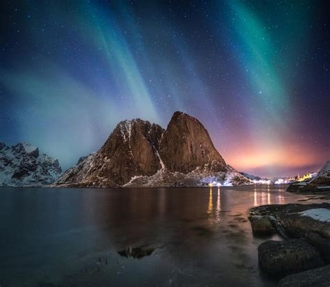 Premium Photo Aurora Borealis On Mountain In Fishing Village At Hamnoy