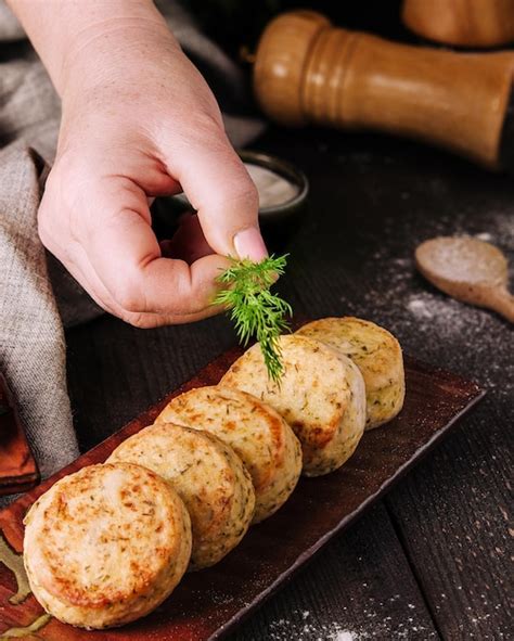 Premium Photo Vegetable Zucchini Pancakes With Cheese Dill And Parsley On A Plate