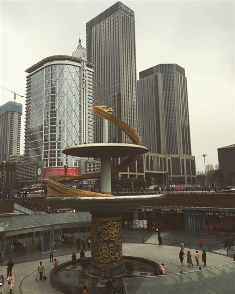 The centre of Chengdu City, the subway underneath exits with escalators ...