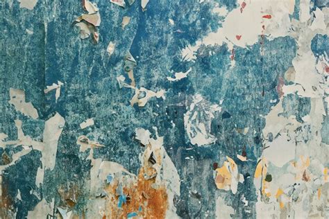 Premium Photo Torn Poster Paper Surface As Abstract Grunge Background