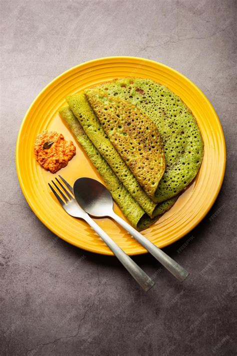 Premium Photo Palak Dosa Made Using Mixing Spinach Or Keerai In