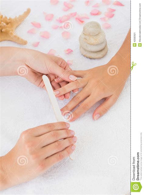 Beautician Filing Female Client S Nails At Spa Beauty Salon Stock Image