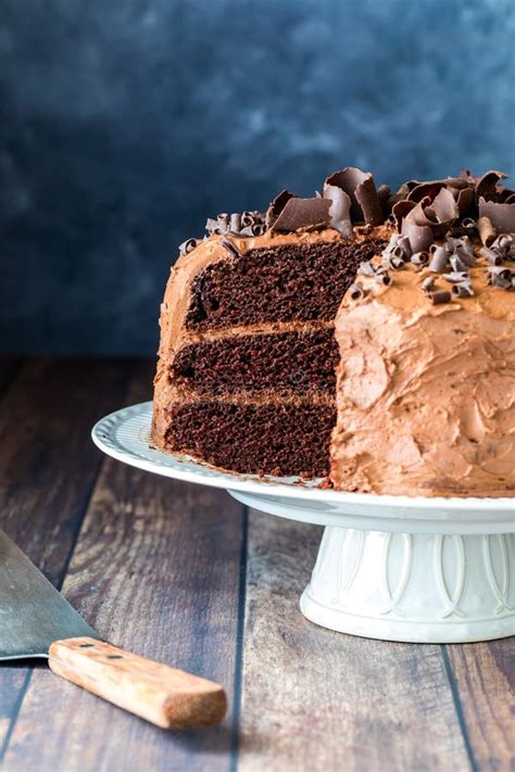 A Triple Layered Decadent Low Sugar Chocolate Cake With One Slice Removed Stock Image Image